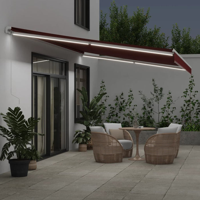 Copertina retractabilă manual cu LED, vișiniu, 600x350 cm